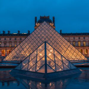 Amazing view from a Louvre Pyramid from a dark and moody day with rainy weather | SUPERPOBYT European